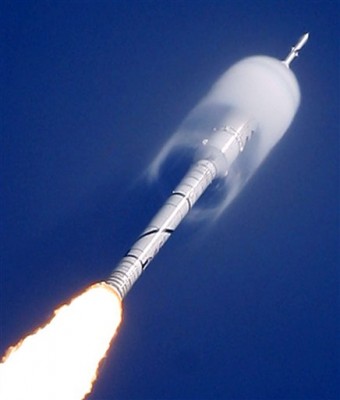 A cone of moisture surrounds part of the Ares I-X rocket during lift off Wednesday, Oct. 28, 2009, on a sub-orbital test flight from the Kennedy Space Center's Launch Pad 39-B in Cape Canaveral, Fla. (AP Photo/Chris O'Meara)